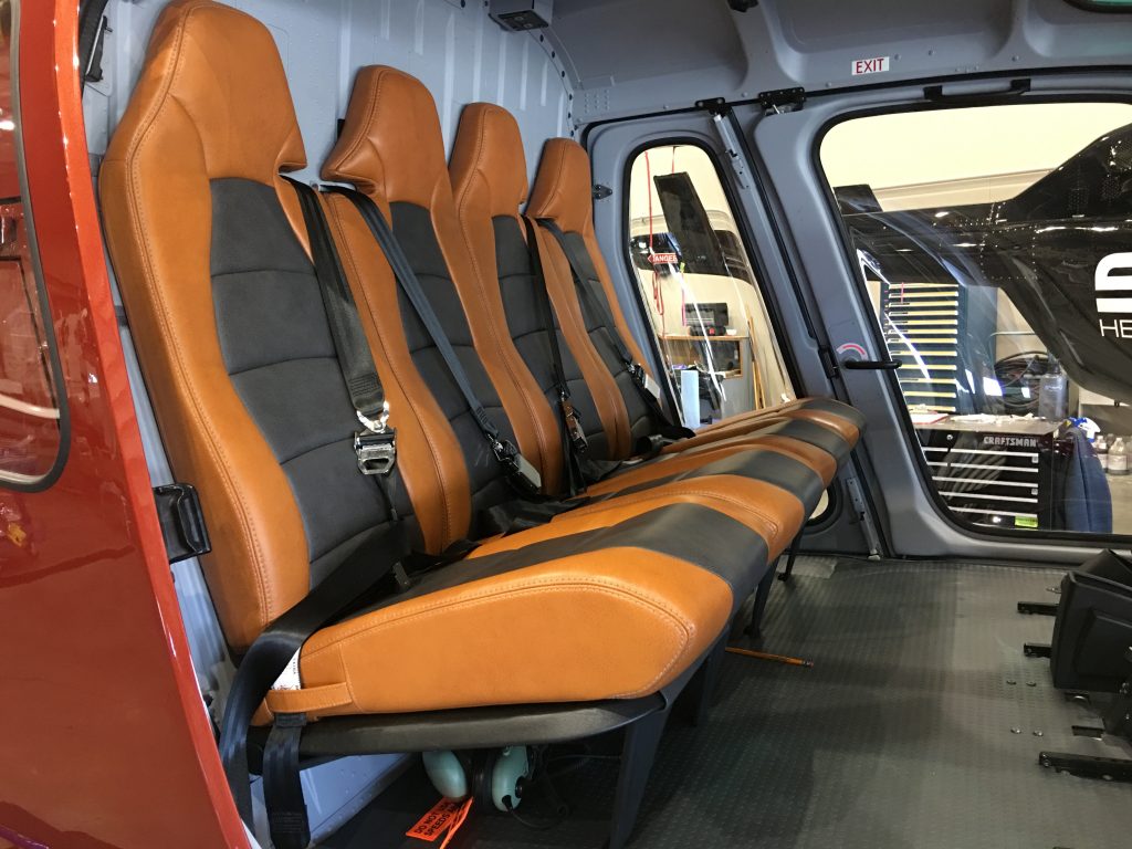 The Leather Bench Seats Located in the Rear of the Helicopter