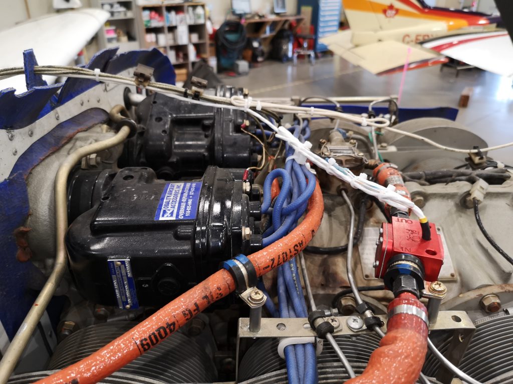 The Fuel Flow Transducer Mounted Under the Cowling