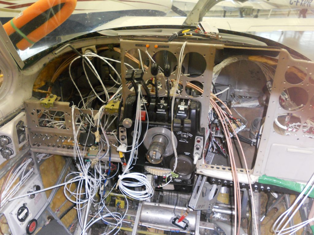 Old Instruments and Much of the Panel Removed While New Wire is Installed