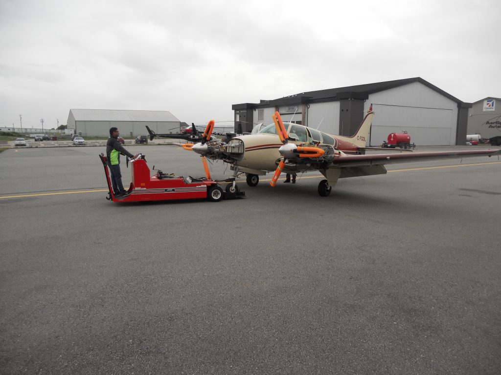 The Beech Baron Being Moved into Our Hangar