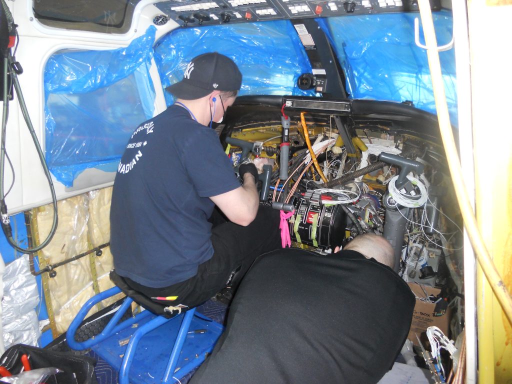 Maxcraft Technicians Route Wires for Various Systems