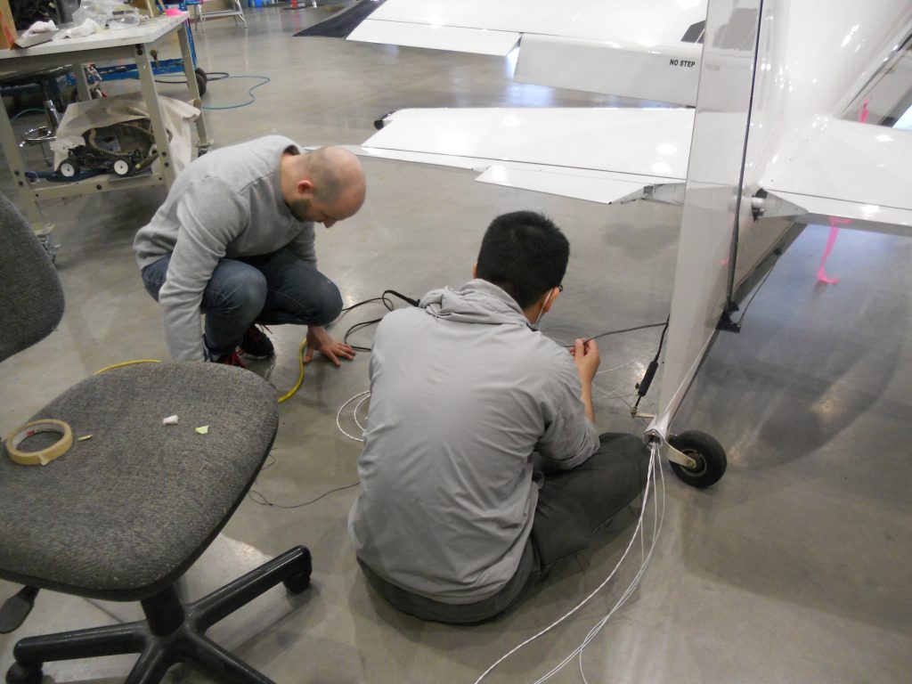 Maxcraft Technicians Pulling Wire to the Tail for the tailBeaconX