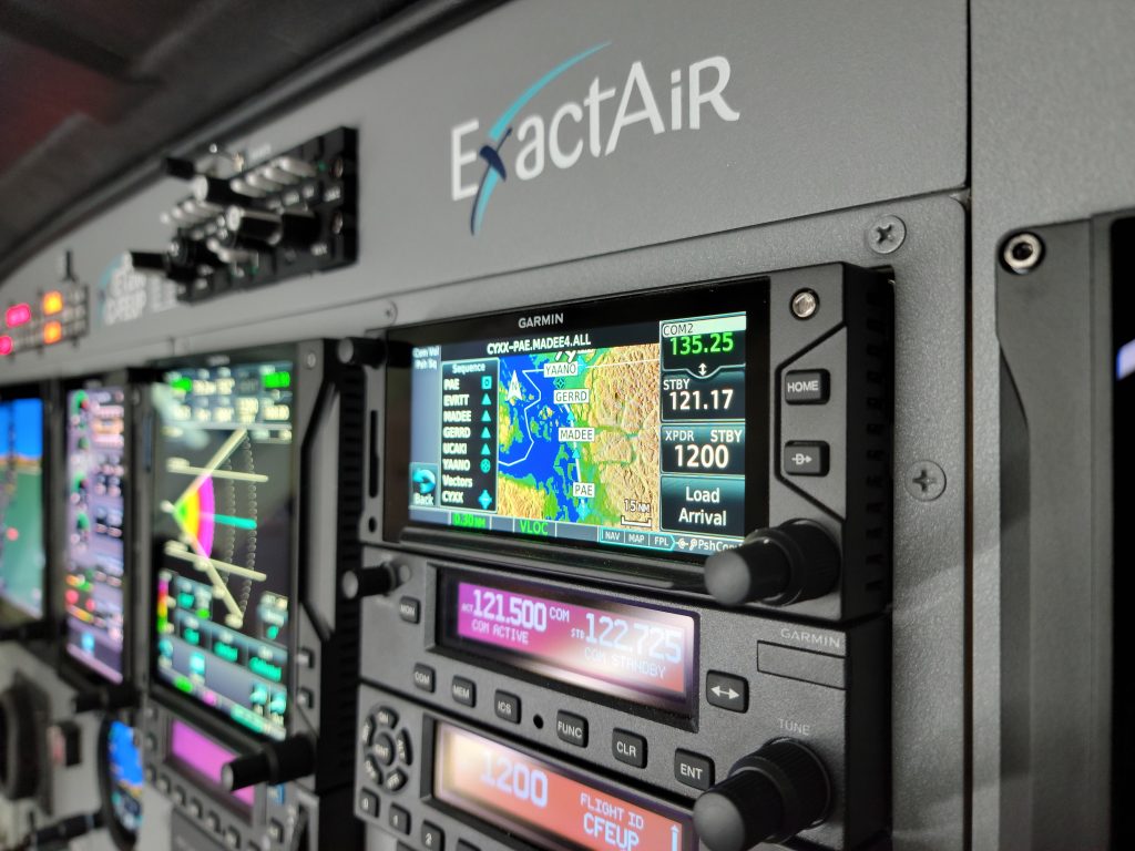 A Closeup of the Radio Stack and the Custom Engraved Multicolour ExactAir Logo