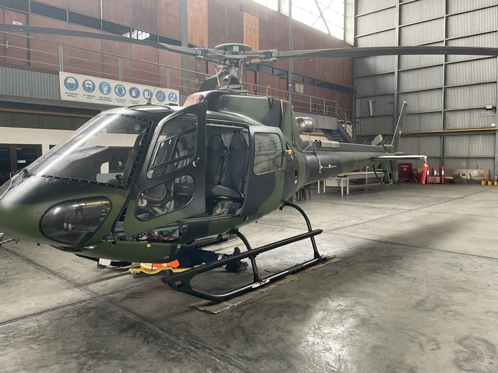 An IDS Technician Working on the AS350 B3 in Their Facility