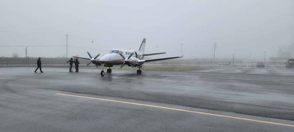 The King Air Being Prepared for a Compass Swing During a Foggy Day
