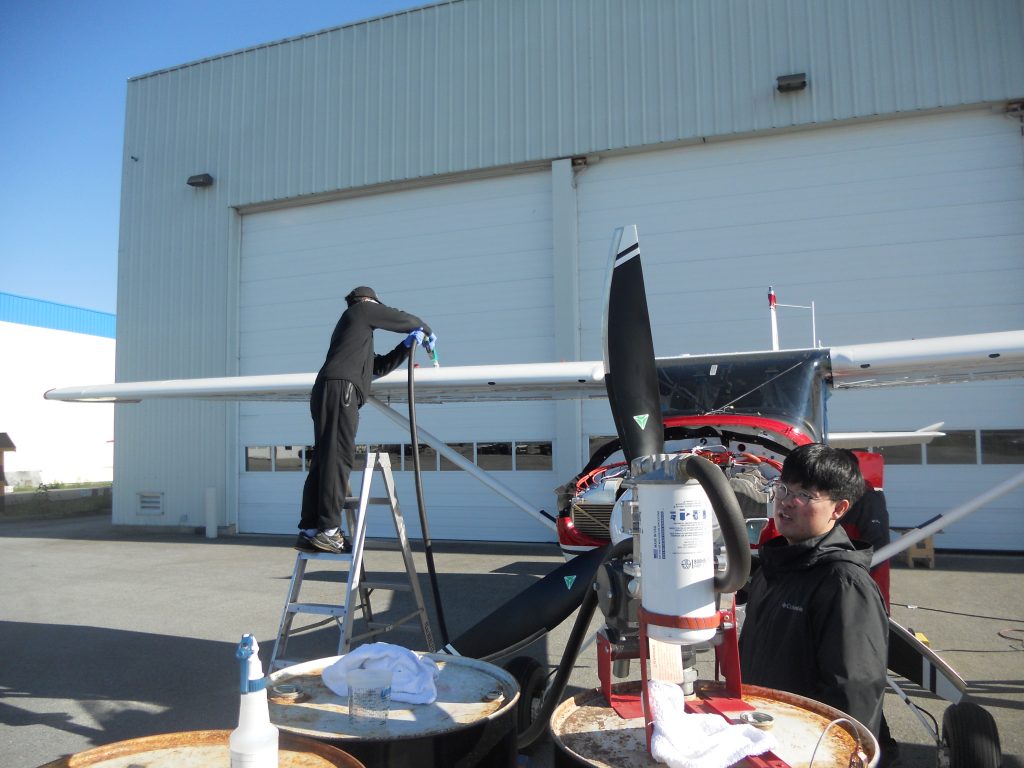 Maxcraft Technicians Performing a Fuel Calibration for the Engine Information System