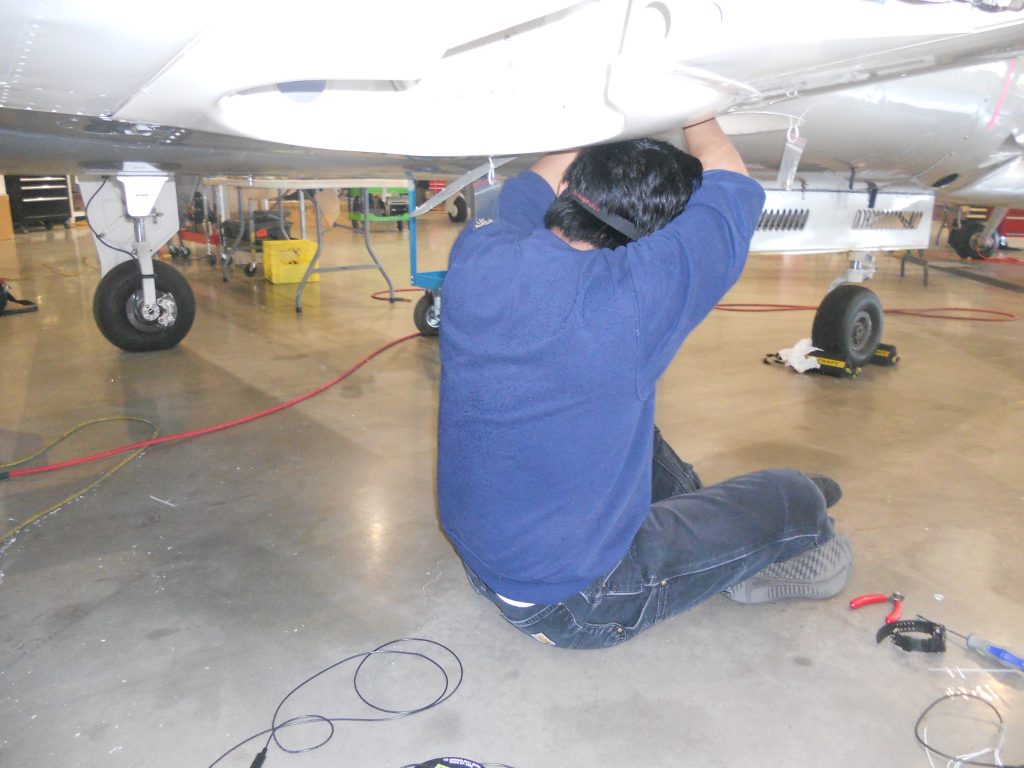 To Access Wiring, Our Technicians Often Need to Get into Less than Comfortable Poses