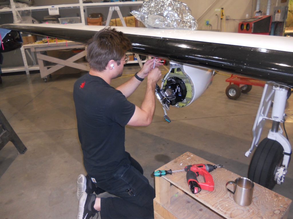 A Maxcraft Technician Installing the New Weather Radar