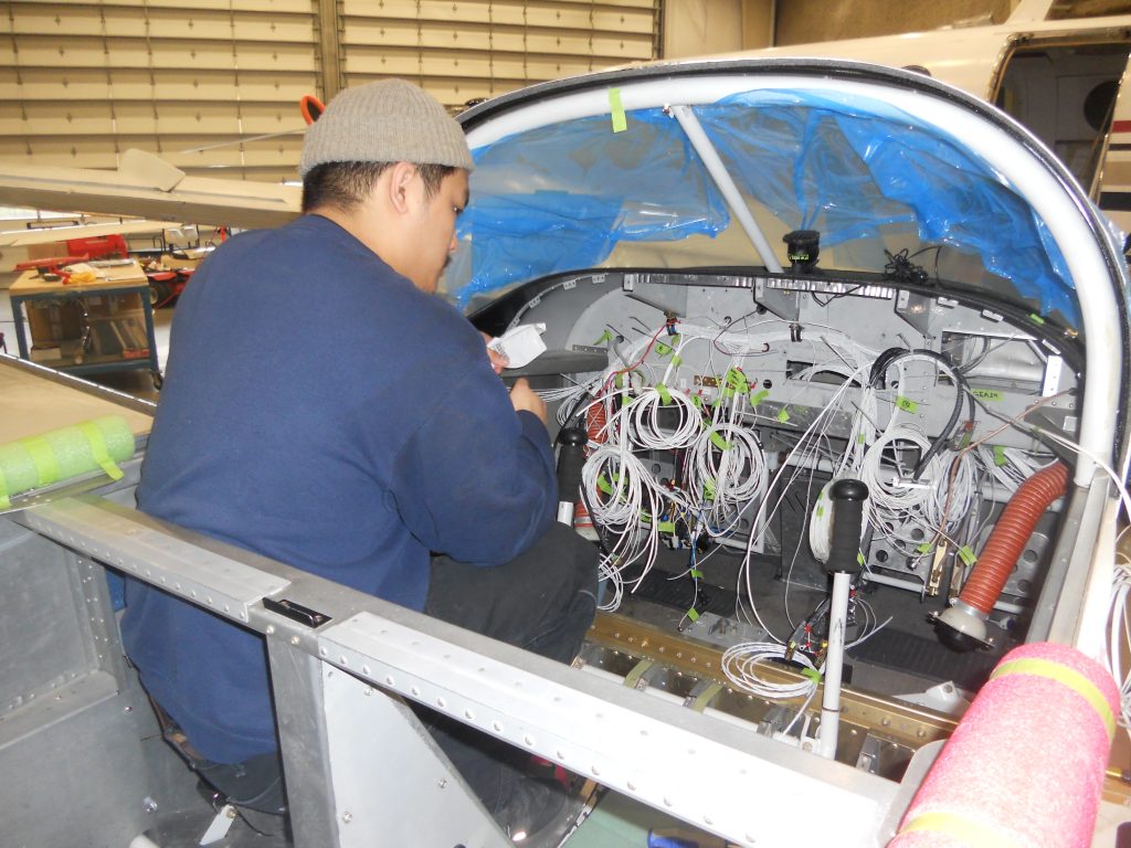 A Maxcraft Technician Routing New Wiring
