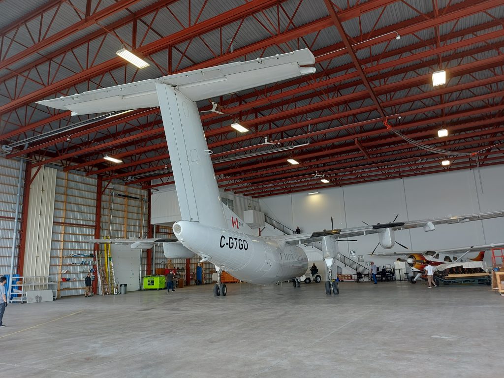 The First Dash 7 Tucked Into its Temporary Hangar Where Much of the Work Would Be Completed