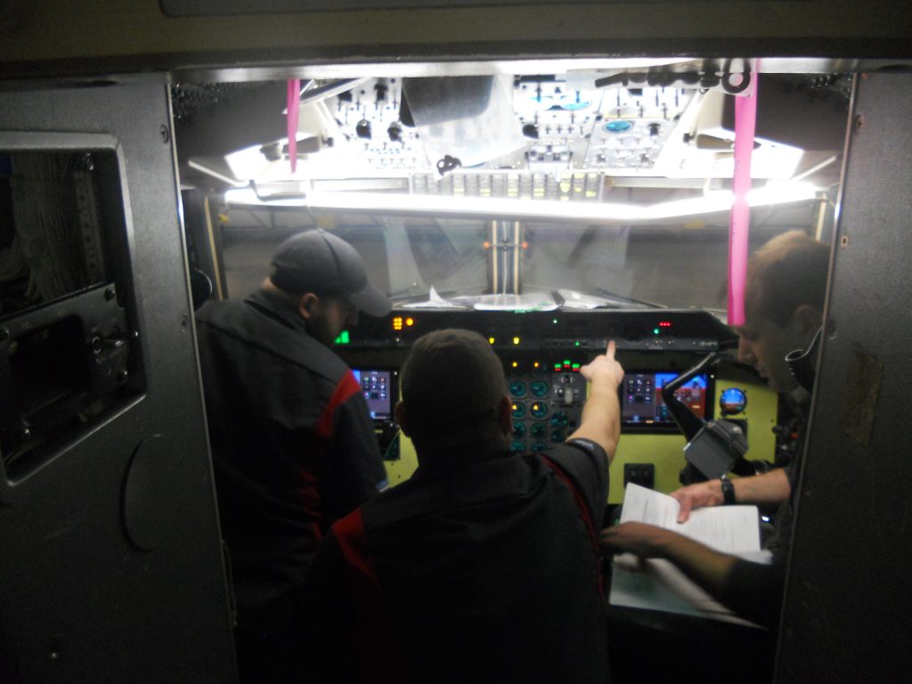 A Group of Maxcraft Technicians Configuring the Newly Installed Avionics