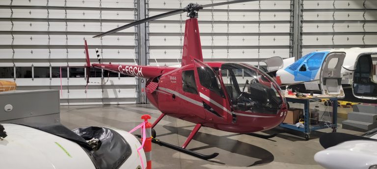 The Robinson R44 Sitting in Maxcraft’s Hangar